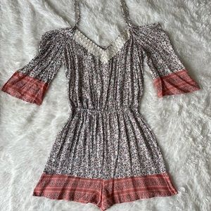 Florally long sleeved romper